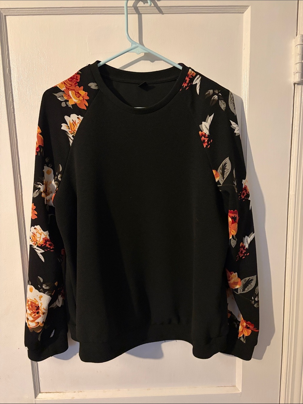 SHEIN Black Crewneck Sweatshirt with Orange Floral Raglan Sleeves